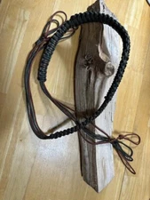 Supreme small game paracord hunting carrier: olive, brown, woodland camo.