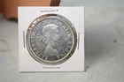 1964 Canadian Silver Dollar, raw