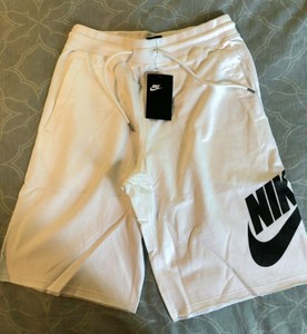 nike loose fit at knee length shorts