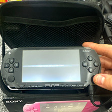Sony PSP-1003 Black PAL Handheld Console w/ 1GB Memory Stick, Box & Case