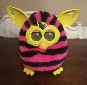 pink and black striped furby