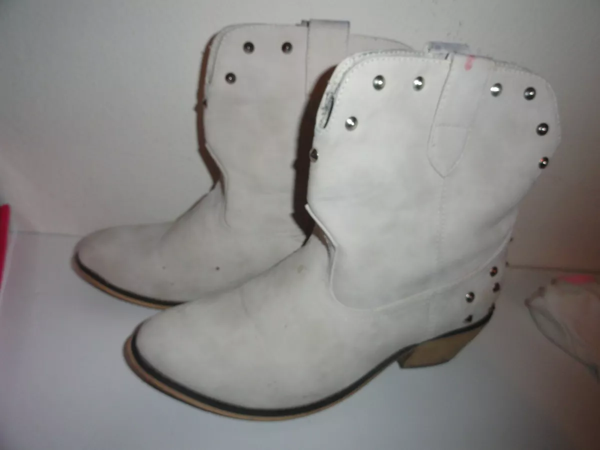 Cream colored cowboy shop boots