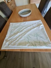used oval table cloth with green grass pattern