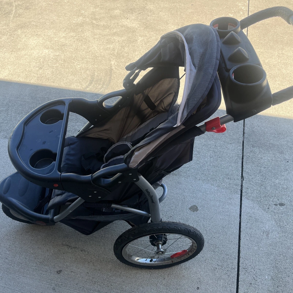 Baby trend jogging stroller red and black top