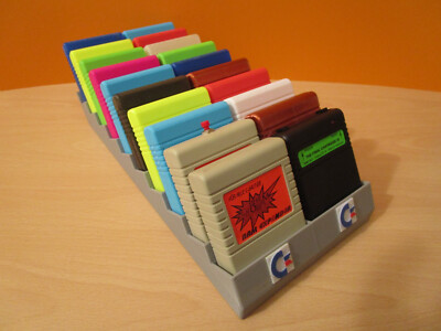 Ständer / Cover ''hell grau'' für 20 Commodore C 64 / C 128 Cartridge / Module