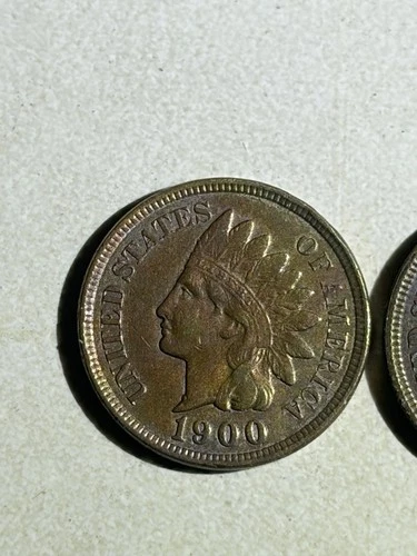 Here are two Proof circulated Indian head pennies 1900 and 1898