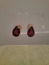 Signed Amco 14K gold filled pear shaped garnet earrings.