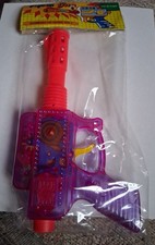 Mint multi-colored vintage space Topic gun toy