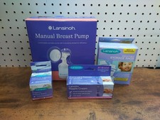 Lansinoh Manual Breast Pump Kit W/ 50 Storage bags, Nipple Cream and Balm
