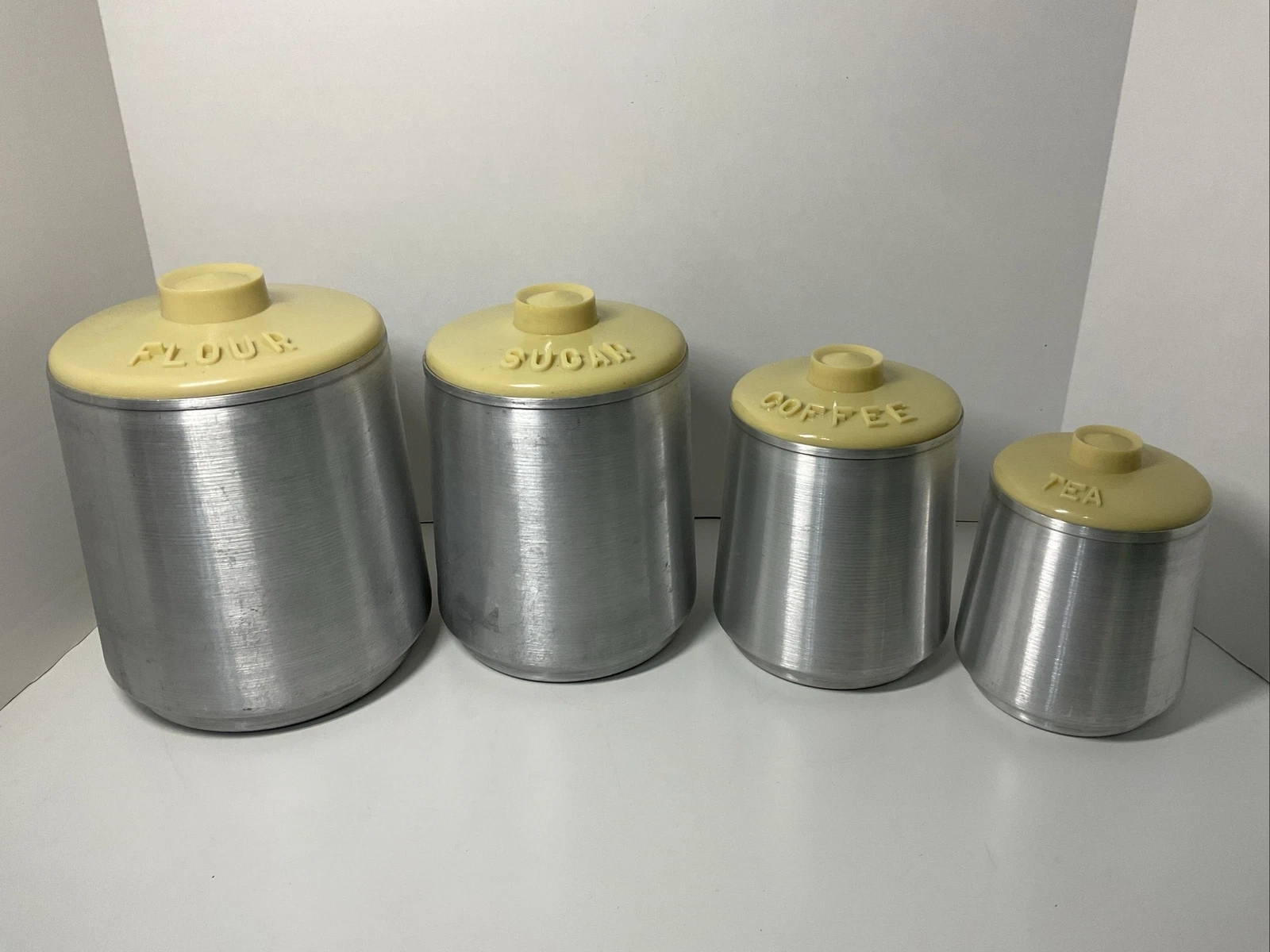 Vintage Kromex Aluminum Canisters Set 4 Yellow Lids Nesting Kitchen Canisters