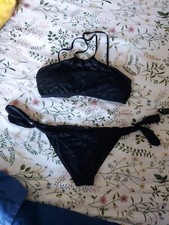 costume tezenis nero taglia 2. effetto pizzo. usato ma in buone condizioni