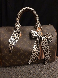 black and brown lv bolsa