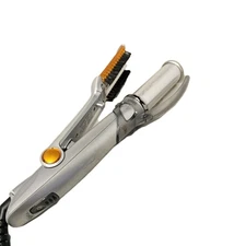 InStyler Rotating Hot Iron 1 1/4 inch- Silver and orange curling Iron Working