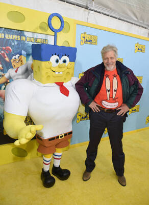 Clancy Brown voice of Mr. Krabs poses with SpongeBob as he at the - Old Photo