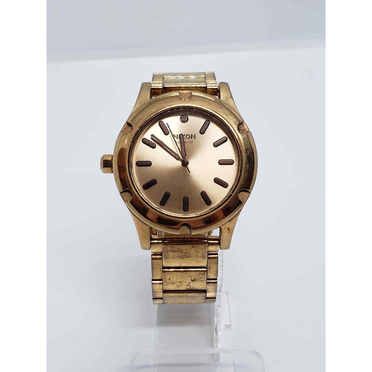 Men's Nixon watch. The Camden. Rose gold face and band