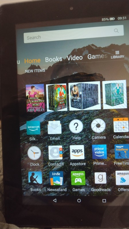 Amazon Fire pre-owned  tablet / E-Reader in excellent working condition