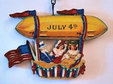 UNCLE SAM in BLIMP w 2 WOMEN, FLAG   Glitter JULY 4 PATRIOTIC ORNAMENT * Vtg Img