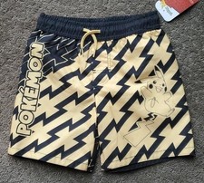 Boys Pokemon Pikachu Black Gold Zigzag Swim Trunks UPF 50 Size XS 4/5 liner NWT