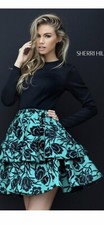 Sherri Hill cocktail dress size 6 black And emerald Green.