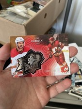 Elias Lindholm 2021-22 Upper Deck SPx Finite #SF7 /2999 - Calgary Flames