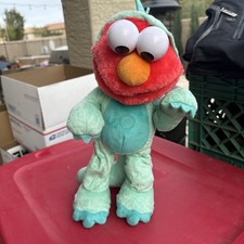 Sesame Street Tickle Me Elmo Dino Dinosaur Stomp Dancing Plush Toy