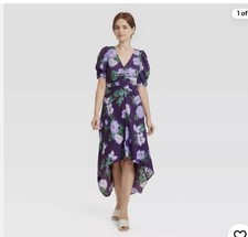 a new day dress new with tags. Purple with flowers
