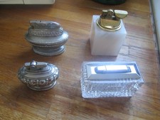 4 VINTAGE TABLE LIGHTERS INCLUDING 1 COLIBRI WITH FACETED GLASS BASE  - NO FUEL