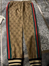  Accessorio uomo Gucci elegante marrone dall'aspetto