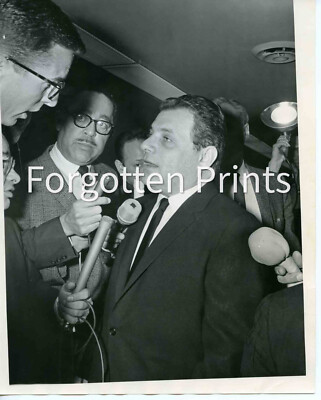 Manny Skar being interviewed by reporters