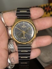 Reloj Pulsera Bermudas Cuarzo Nivada Vintage Movimiento Suizo Negro Acero Inoxidable Dorado