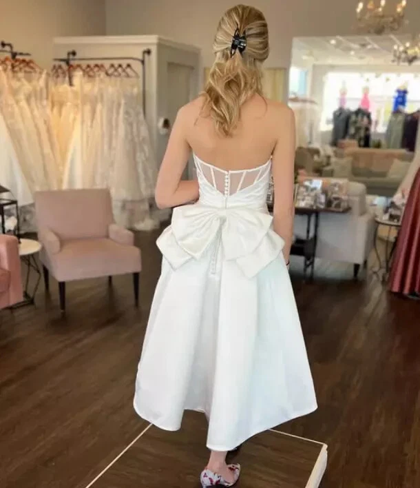 Vestidos de novia cortos con lazo satinado playa fuera del hombro boho mini vestidos de novia Foto 3 de 4