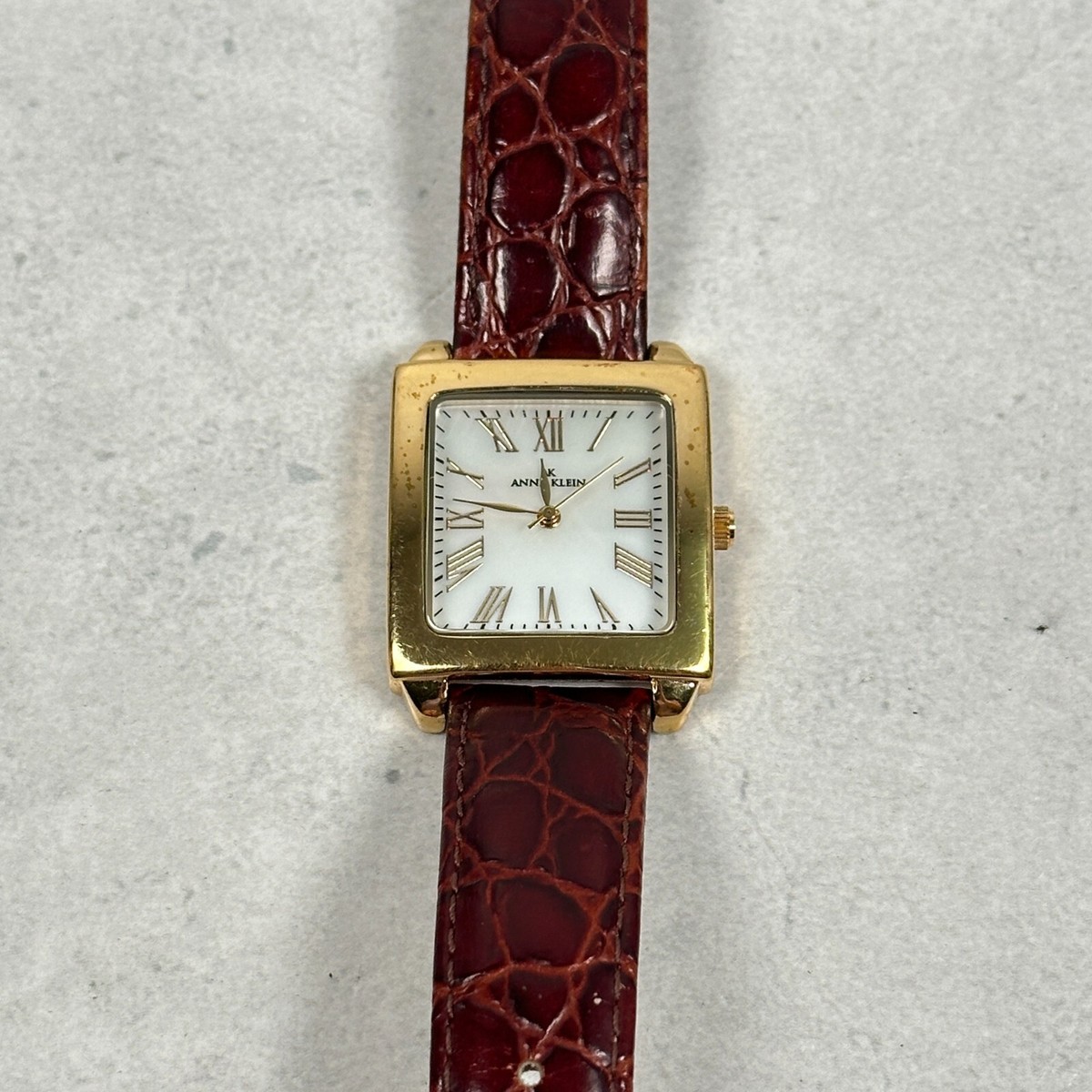 Anne Klein Watch Womens 29mm MOP Dial Brown Embossed Band 