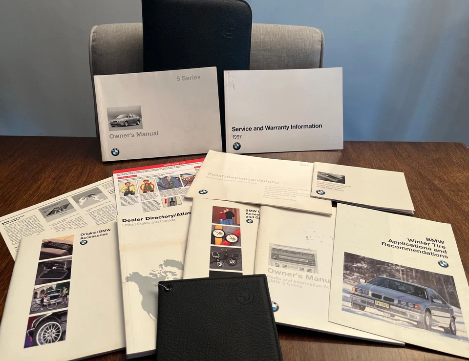 BMW 1997 E39 528/540i propietario 1 juego de 11 manuales/papeles y estuche BMW NEGRO 1 Foto 2 de 3