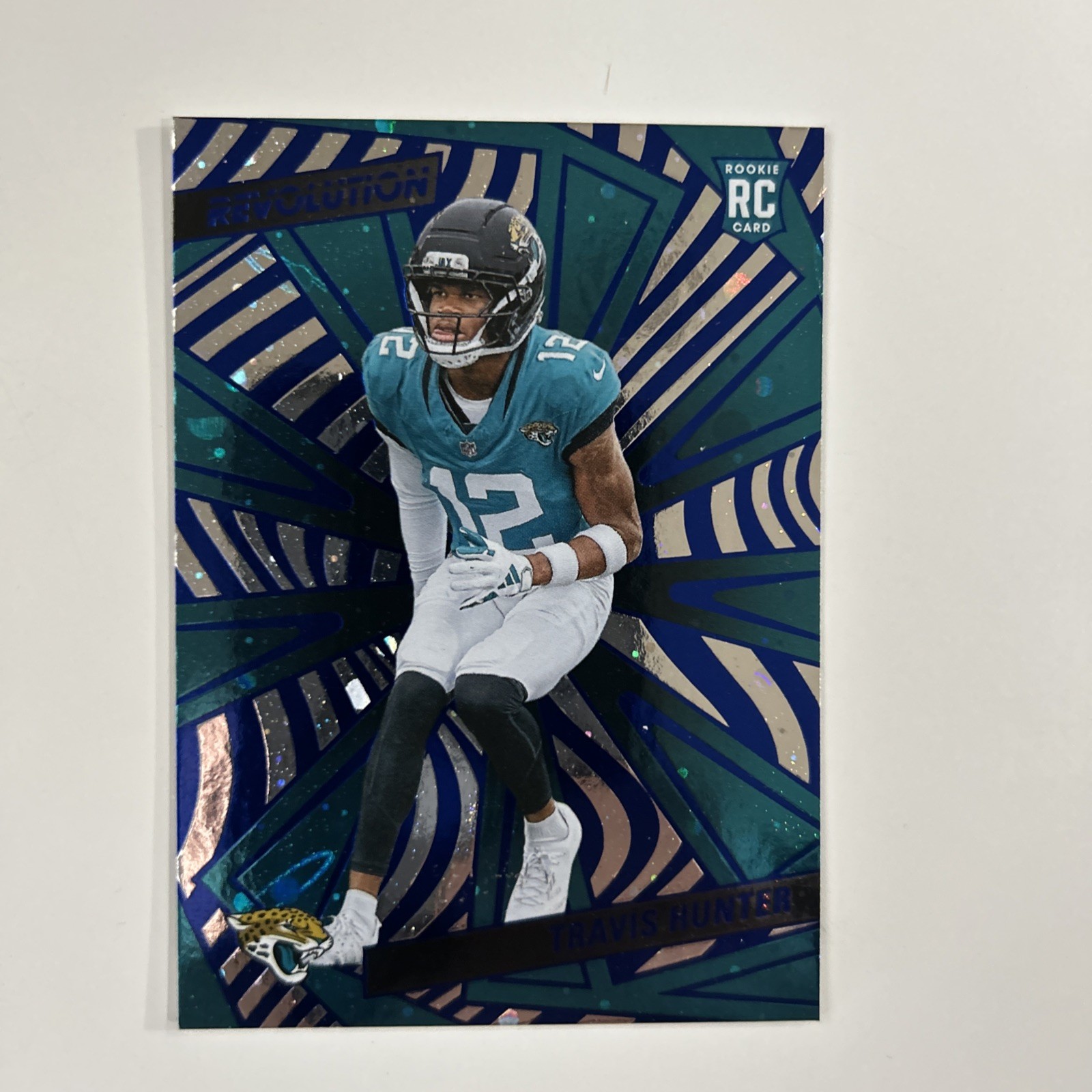 2025 Panini Revolution Travis Hunter Cosmo Blue Rookie Numbered 69/99 242 RC