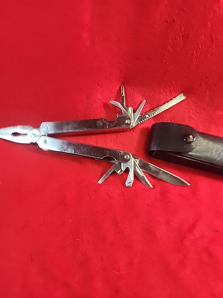 12-in-1 Multi-Tool Kit with Pliers, Knife, Bottle Opener & Ruler in Case  