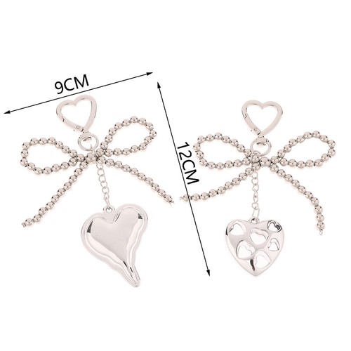 1 pièce Bowknot soldes Heart Keynchain Femmes Sweet Pearl Bow Sackepack Key Ring