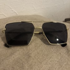 Occhiali da sole Cartier in metallo dorato montatura oro