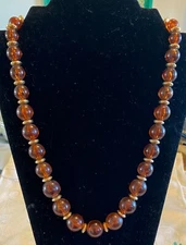 Vintage Napier necklace, amber color lucite beads,gold tone disc beads, signed