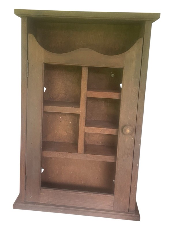 vintage wooden wall-mounted curio cabinet featuring small internal compartments