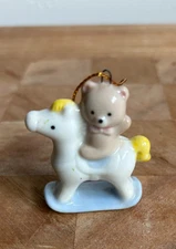 Russ Berrie and Co. Teddy Bear on rocking horse in porcelain.  Item 2863 Japan