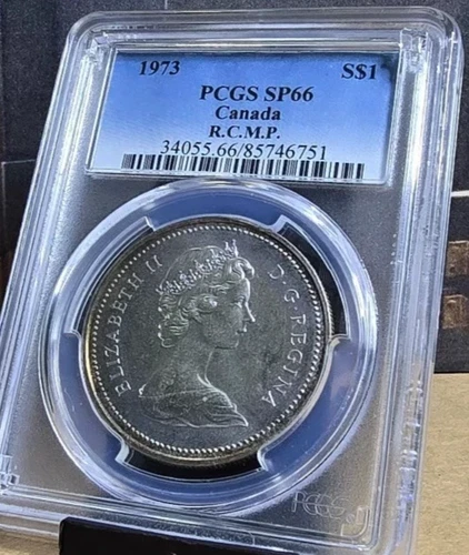 1973 Canada Silver Dollar PCGS SP66 R.C.M.P. BEAUTY Rainbow Toned Reverse