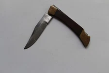 Petit couteau pliant de poche marron ancien, manche en bois et lame en acier