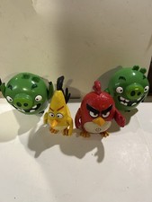 Angry Birds Figurines Lot Of 4 Red Chuck Two Green Pigs Yellow Bananna READ