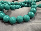 Lightweight Turquoise Plastic Round Beads, 12mm, 57 Count, 25” Strand — photo 1