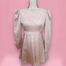 Vintage Pink Ruffle Dress With A Bow