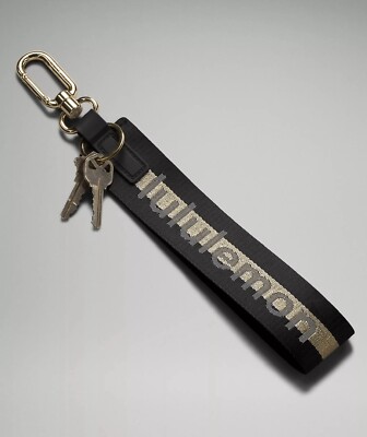 Lululemon 🖤 Black & Metallic Gold Never Lost Wordmark Logo