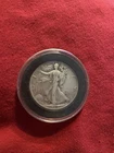 Walking Liberty Half Dollar, a US 50-cent coin that was minted 1946 Plastic Case