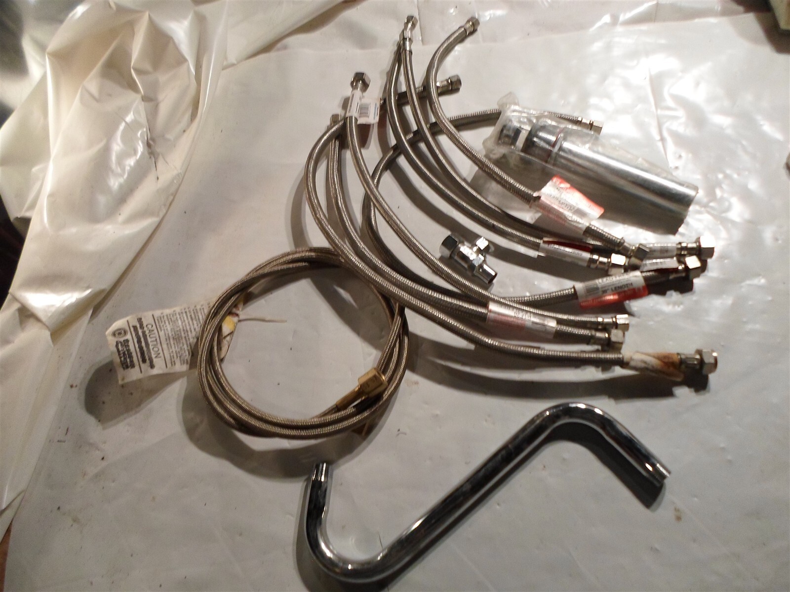 Large lot of plumbing items: 7 x ss braided supply hose line, drain, valve +more