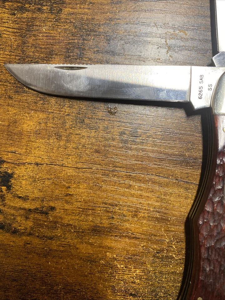 CUCHILLO DE CAZADOR PLEGABLE JUMBO MADERA JIGGED CASE XX EE. UU. 1978 2 PUNTOS 6265 SAB Foto 3 de 4
