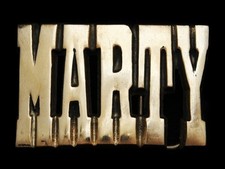 MG25118 VINTAGE 1970s CUT-OUT NAME  MARTY  SOLID BRASS BELT BUCKLE